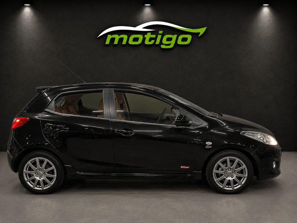 Mazda 2 , 1.3 |GT-M Line airco/stl verw./leder/cruise/pano 53659411-3.jpg | Motigo