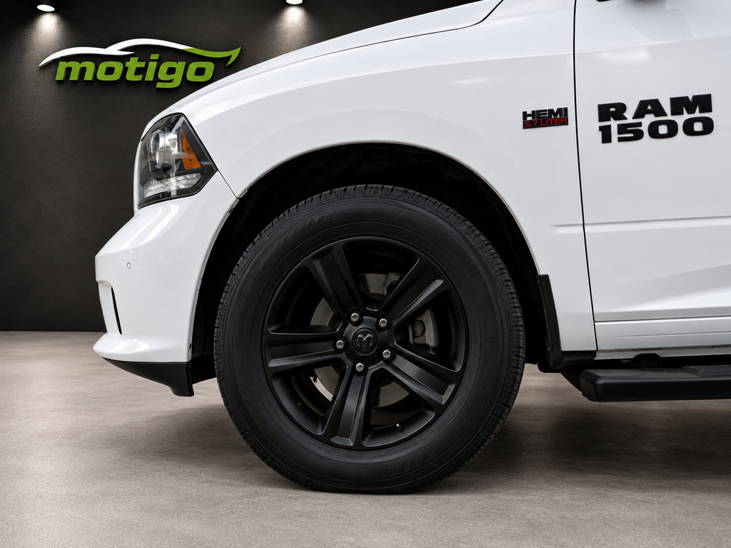Dodge Ram 1500 4X4 5.7 V8 4x4 Quad Cab 6'4 Sport 56657366-3.jpg | Motigo
